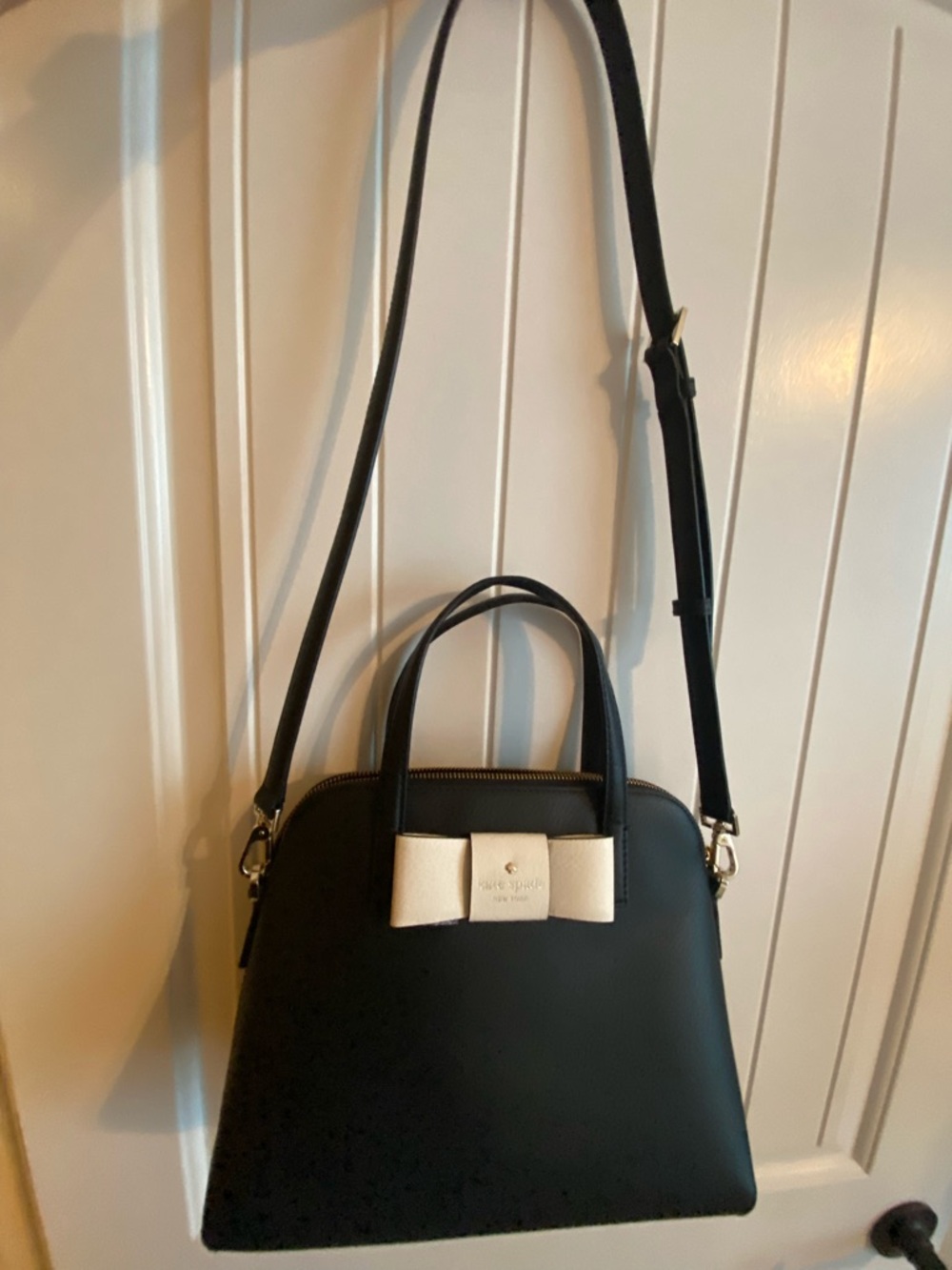 Kate Spade black satchel with white bow accent. Beautiful! - Picture 6 of 11